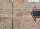 Brick Wall with Arrow